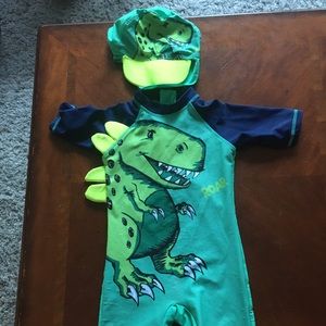 Boys size 4 t-Rex water suit with matching hat